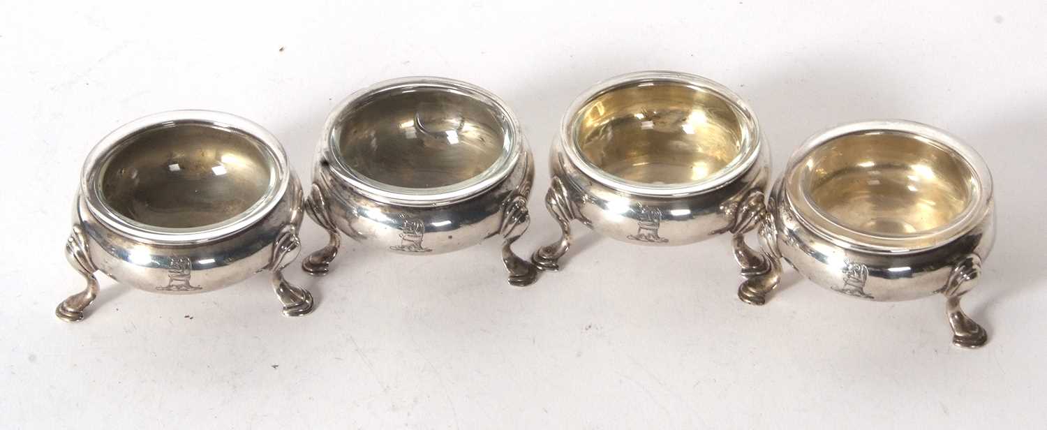 Four George III silver cauldron salts, raised on three hoof feet with later clear glass liners, - Image 3 of 5