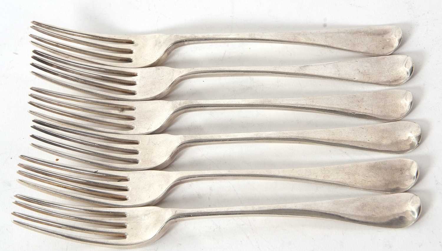 A group of six silver Victorian dessert spoons, four for London 1884 and two for London 1892, g/w