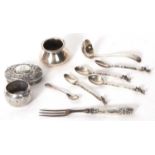 Mixed Lot: Two hallmarked silver lids and a serviette ring engraved "Brian", a silver ladle,