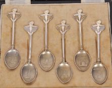 Cased set of George VI silver gilt commemorative teaspoons, each bowl with a London landmark to