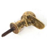 An antique brass cast jockeys head walking stick screw in handle, 9cm long