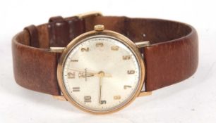 A 9ct gold gents Omega wristwatch stamped 375 on the inside of the case back, it has a manually