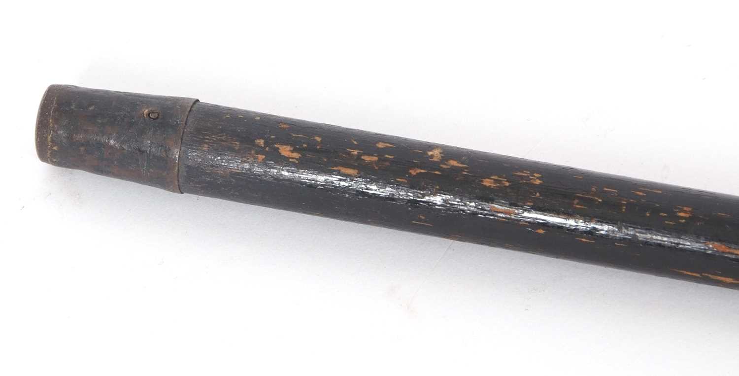 An early 20th Century black painted tapering cane, hallmarked silver handle for London 1920, - Image 3 of 4