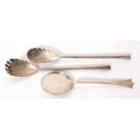 Mixed Lot: A pair of George V silver salad servers with plain tapering cylindrical handles and shell