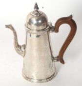 A George VI silver coffee pot of slight tapering cylindrical form having a domed cover with scroll