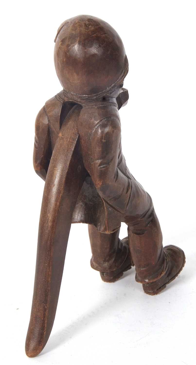 A vintage Black Forest nut cracker, circa 1930 of figural form showing a seated older man with a - Image 4 of 7