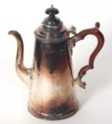 A Georgian style coffee pot of slight tapering cylindrical form, domed lid with turned wood finial