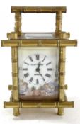 Al Elliot & Son of London clock, the clock has a glass front and back with two enamel side panels