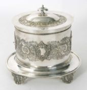 An early 20th Century Mappin & Webb princes plate biscuit barrel of oval form and the body