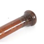 A vintage tapered yard/metre stick having turned finial and measure increments to one side, 112cm