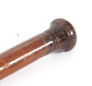 A vintage tapered yard/metre stick having turned finial and measure increments to one side, 112cm