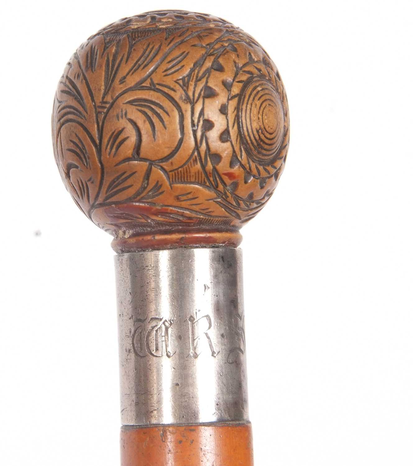 An antique walking stick with ball finial, carved with foliate and geometric designs with a metal - Image 7 of 10