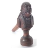 Vintage carved nut cracker of a mans head and torso on a plinth base, 15cm tall