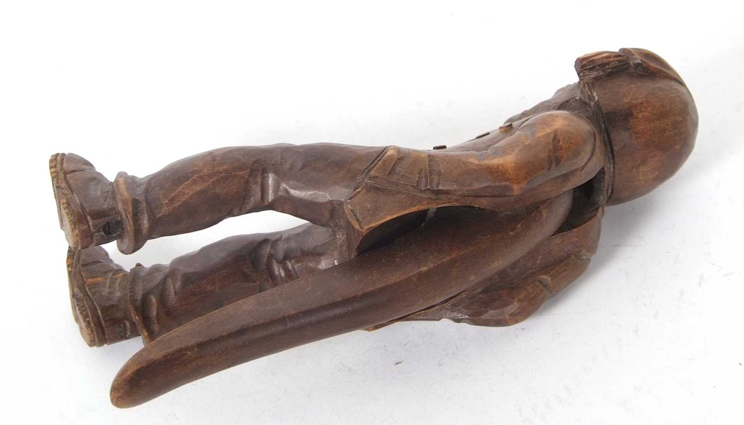 A vintage Black Forest nut cracker, circa 1930 of figural form showing a seated older man with a - Image 7 of 7