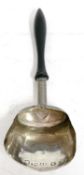 A George III silver caddy spoon with shovel shaped bowl and turned ebonised handle, hallmarked for