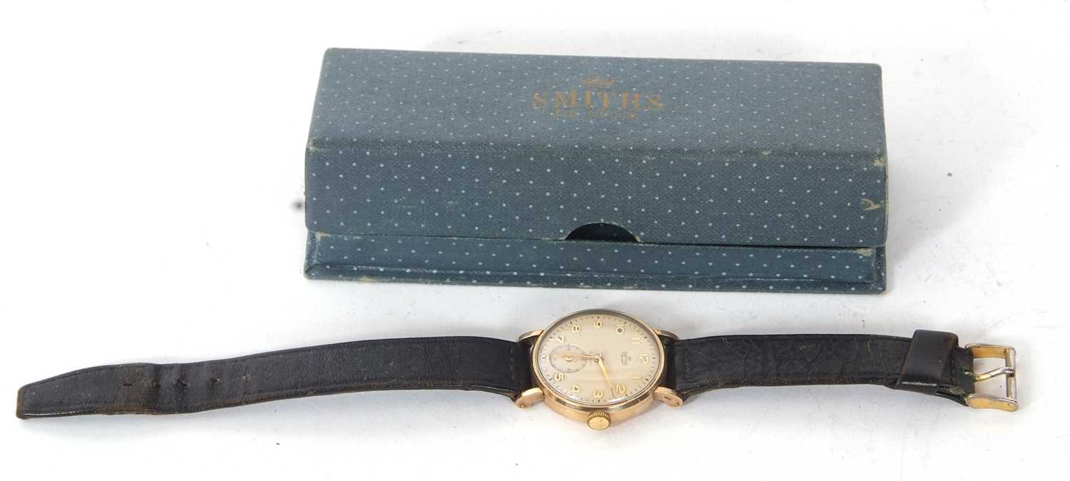 A 9ct gold Smiths Deluxe wristwatch with box, the watch is stamped 375 on the inside of the case - Image 2 of 5