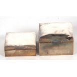 Mixed Lot: Two silver cigarette/boxes of square form, wood lined and loaded bases, marks rubbed