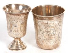A Russian silver beaker/vodka cup, chased and engraved, the assay mark is B.N1885, 84 standard