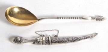 Mixed Lot: A Russian silver spoon with oval gilt bowl, twist stem and shell finial, 19cm long