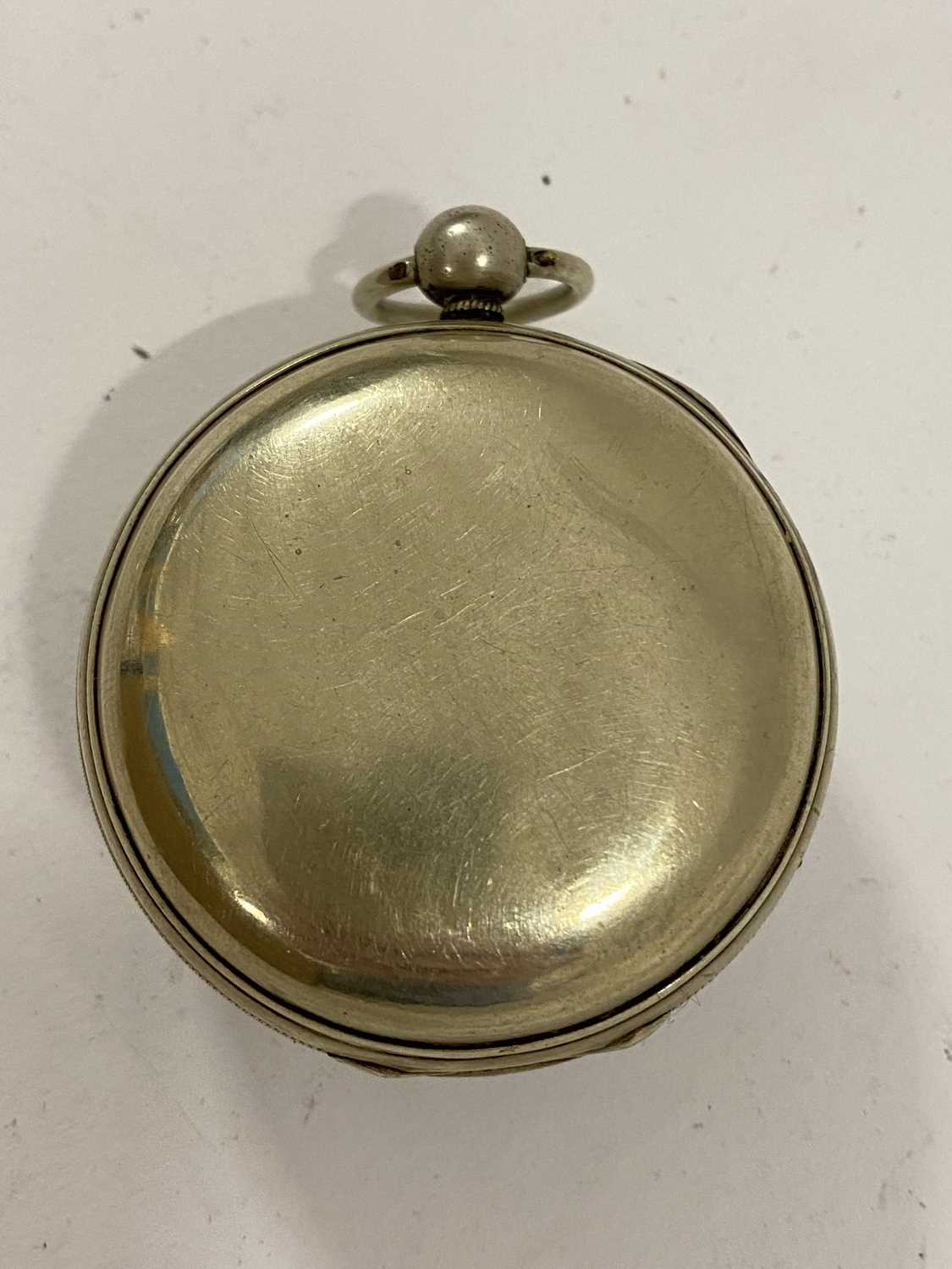 Spendlove, London, base metal cased pocket watch, lacking hands, Movement untested 4.5cm diameter - Image 2 of 2