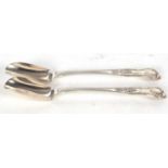 Pair of late Victorian Kings pattern silver stilton scoops, engraved with a bird above initials,