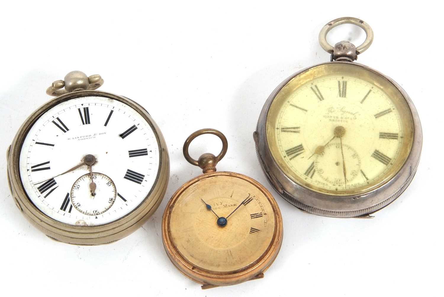 A mixed lot of three pocket watches, two of which are base metal and one is white metal stamped 0.