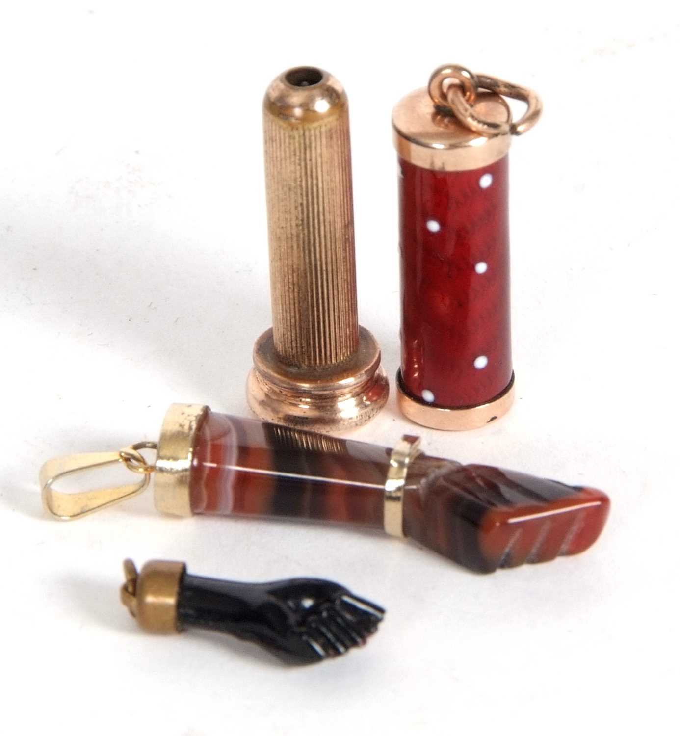 Mixed Lot: An antique enamel extending telescope pencil charm together with two figure Good Luck