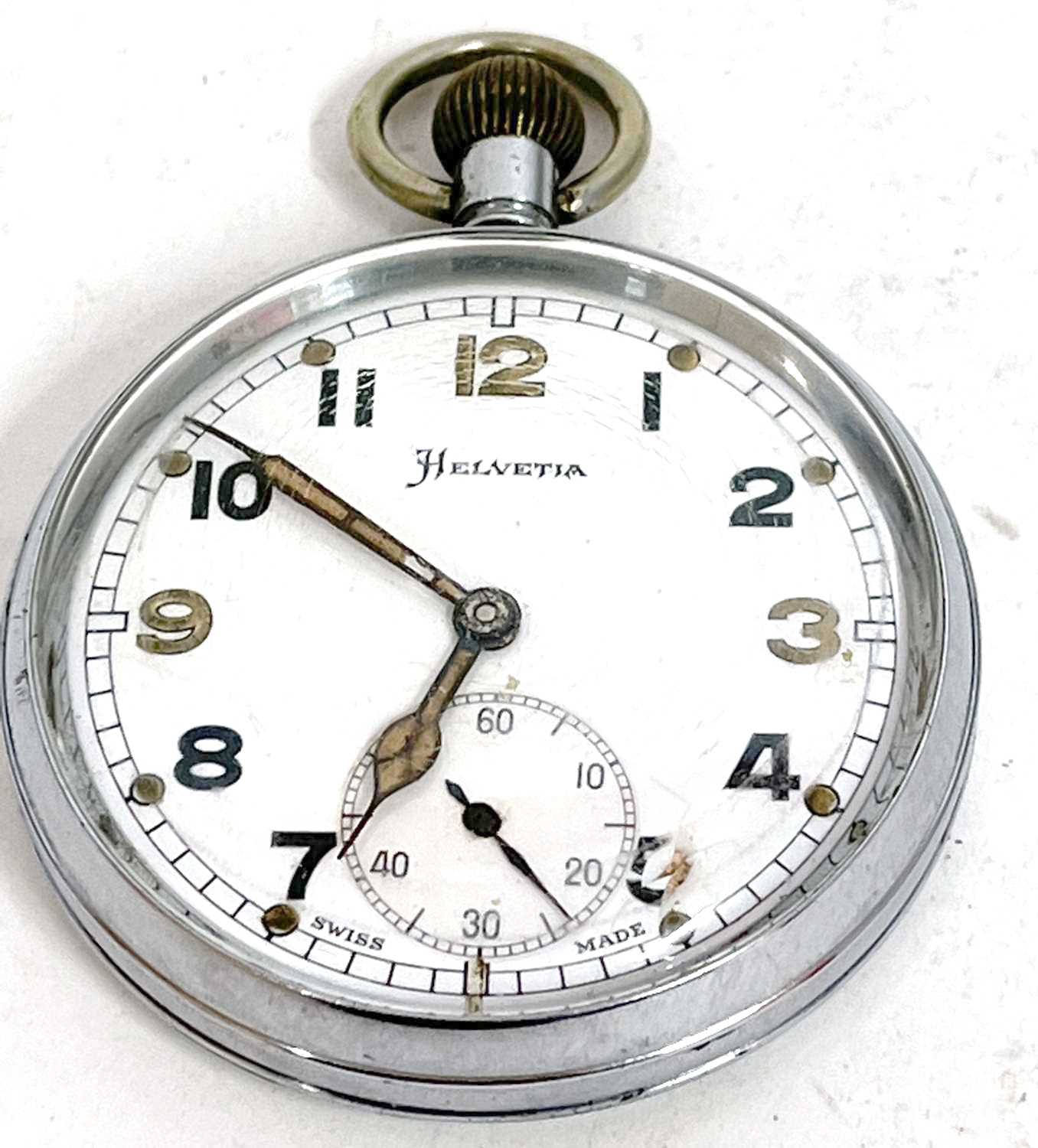 A Helvita military pocket watch, the pocket watch has a manually crown wound movement, the case