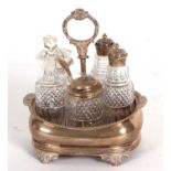 A Georgian silver framed five bottle cruet set, boat shaped and applied gadrooned and shell rim,