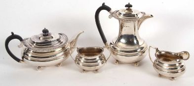 A four piece silver tea and coffee service of oval form comprising coffee pot, Sheffield 1925,