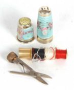 Vintage enamel sewing necessaire, it unscrews to reveal a metal spoof for thread, the top section