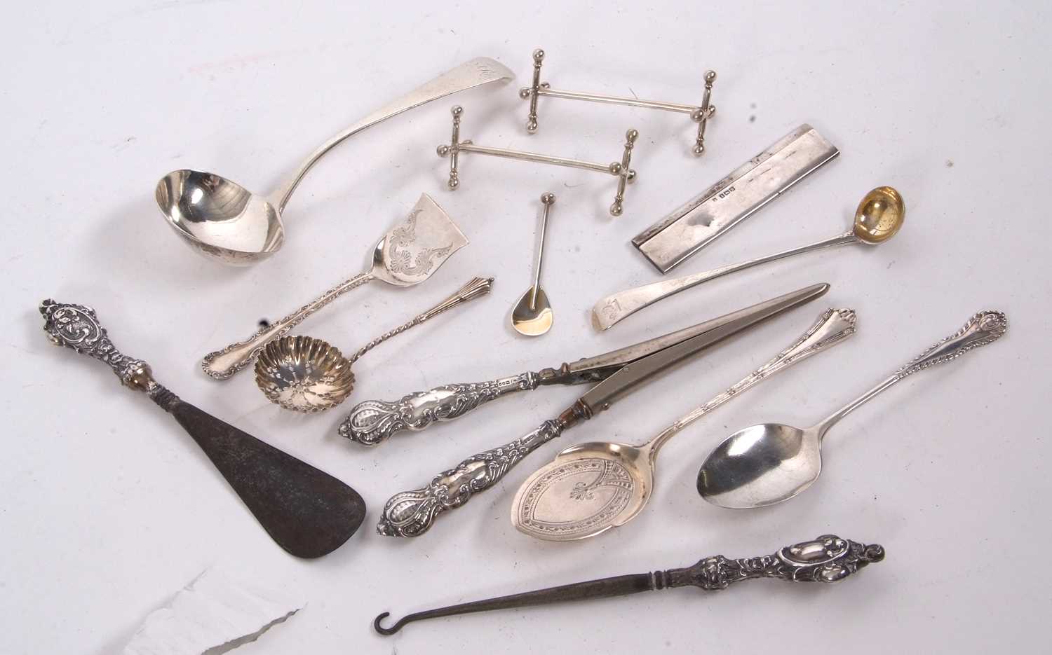 Mixed Lot: George III silver sauce ladle, a pair of Victorian silver knife rests, a Victorian long - Image 2 of 2