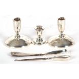 Mixed Lot: A pair of Gorham sterling dressing table candlesticks, (loaded) (a/f), a single small