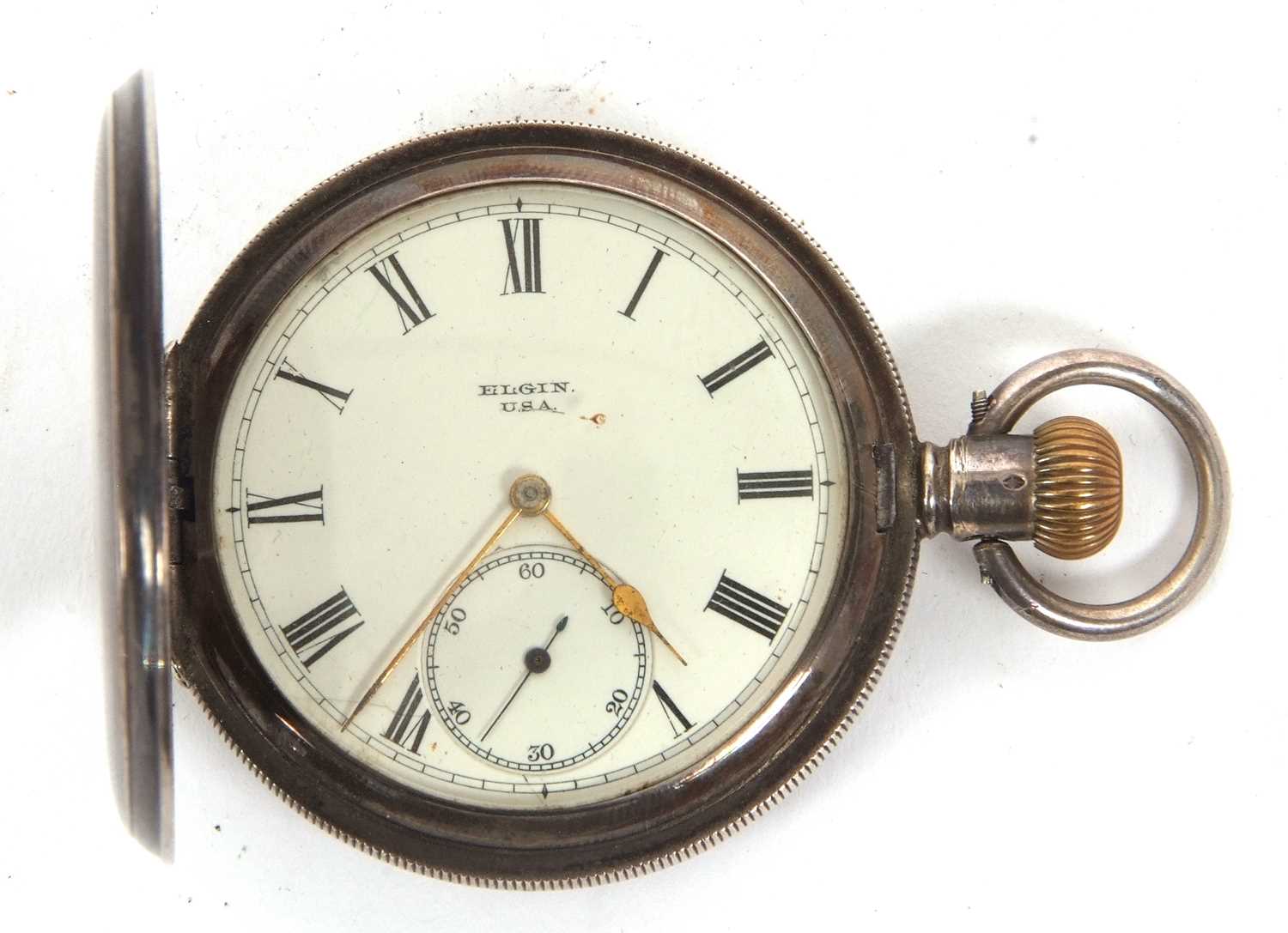 A white metal Elgin Hunter pocket watch, the watch is stamped inside the case back 925, it has a