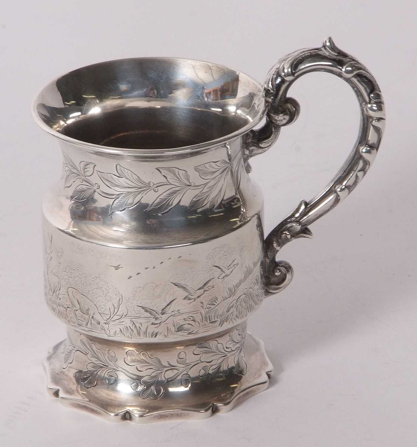 A Victorian silver small mug of cylindrical form, engraved and chased with birds, deer and foliate - Image 3 of 5