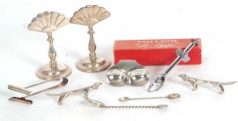 Group of small plated wares to include a pair of fan shaped menu holders, a pair of dog knife rests,