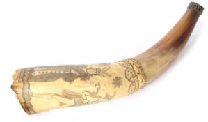 An early 19th Century scrimshaw decorated powder horn, the cow horn decorated with European