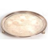 Victorian silver salver of round form, raised reeded edges, the centre engraved with a Latin verse