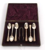 A cased Victorian Old English pattern set of six silver teaspoons having bright cut decoration,