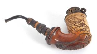 A hand carved German Meerschaum pipe, the bowl decorated with a galloping horse and dated beneath