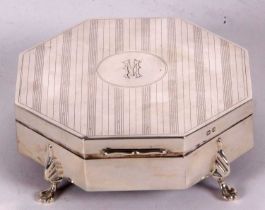 A George VI silver jewellery or ring box of octagonal form, engine turned decorated hinged lid and