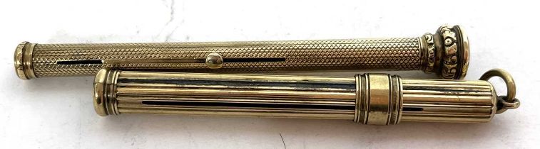 A 9ct gold pencil holder by Sampson Mordan & Co with reeded decoration, top and top loop, 8cm long