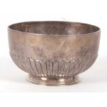 A Victorian small silver pedestal bowl, the body with half fluted design and supported on a collet