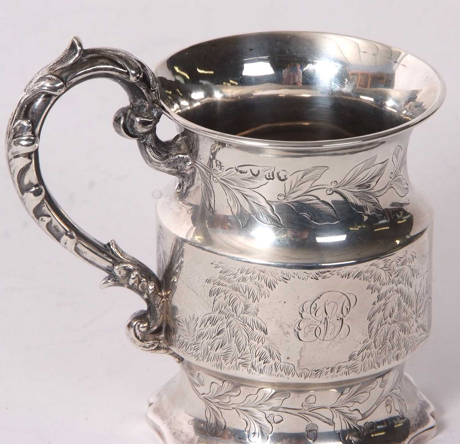 A Victorian silver small mug of cylindrical form, engraved and chased with birds, deer and foliate - Image 5 of 5