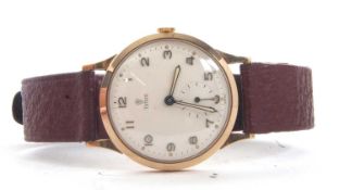 A 9ct gold gent's Tudor wristwatch, the watch has a manually crown wound 18 ruby movement, the
