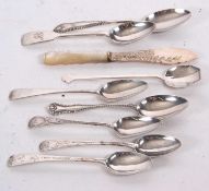 Mixed Lot: Four Georgian Old English silver patterned teaspoons, three with bright cut decoration, a