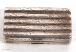 A George III silver snuff box of rectangular form with ribbed design and chased with floral pattern,