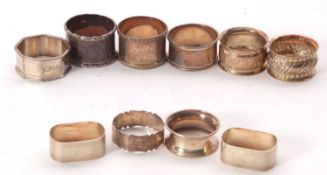 A group of ten hallmarked silver serviette rings, various dates and makers, 194gms
