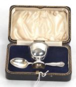Cased silver christening spoon and egg cup, hallmarked for Sheffield 1931/32, the egg cup engraved