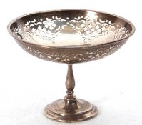 A George V silver small tazza/bonbon dish, the bowl pierced with a geometric design on a baluster